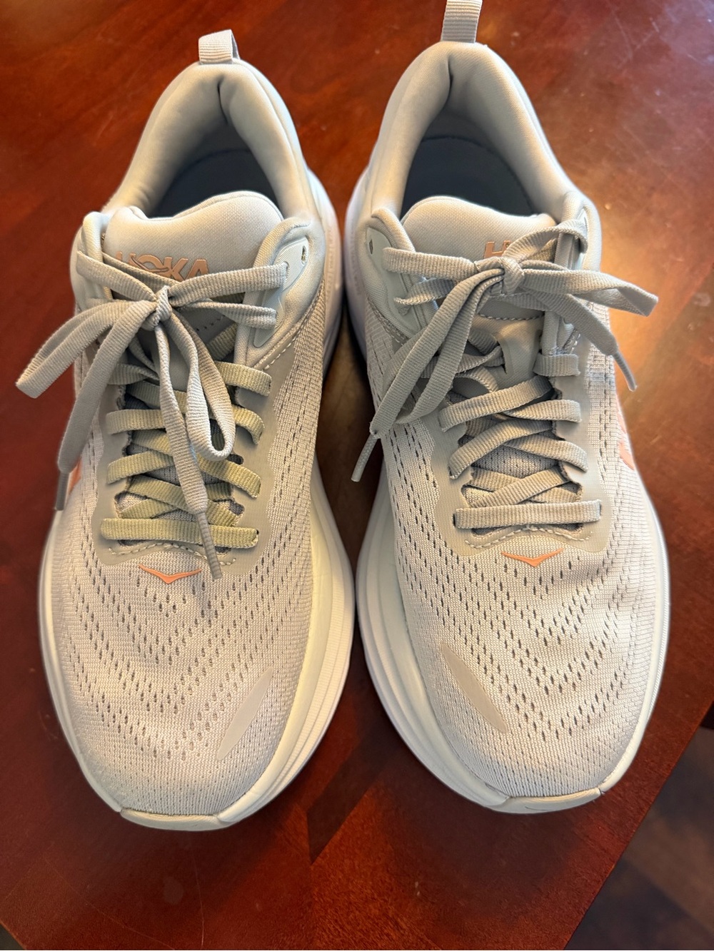 Hoka Women's Running Shoes in Light Gray with Peach Accents